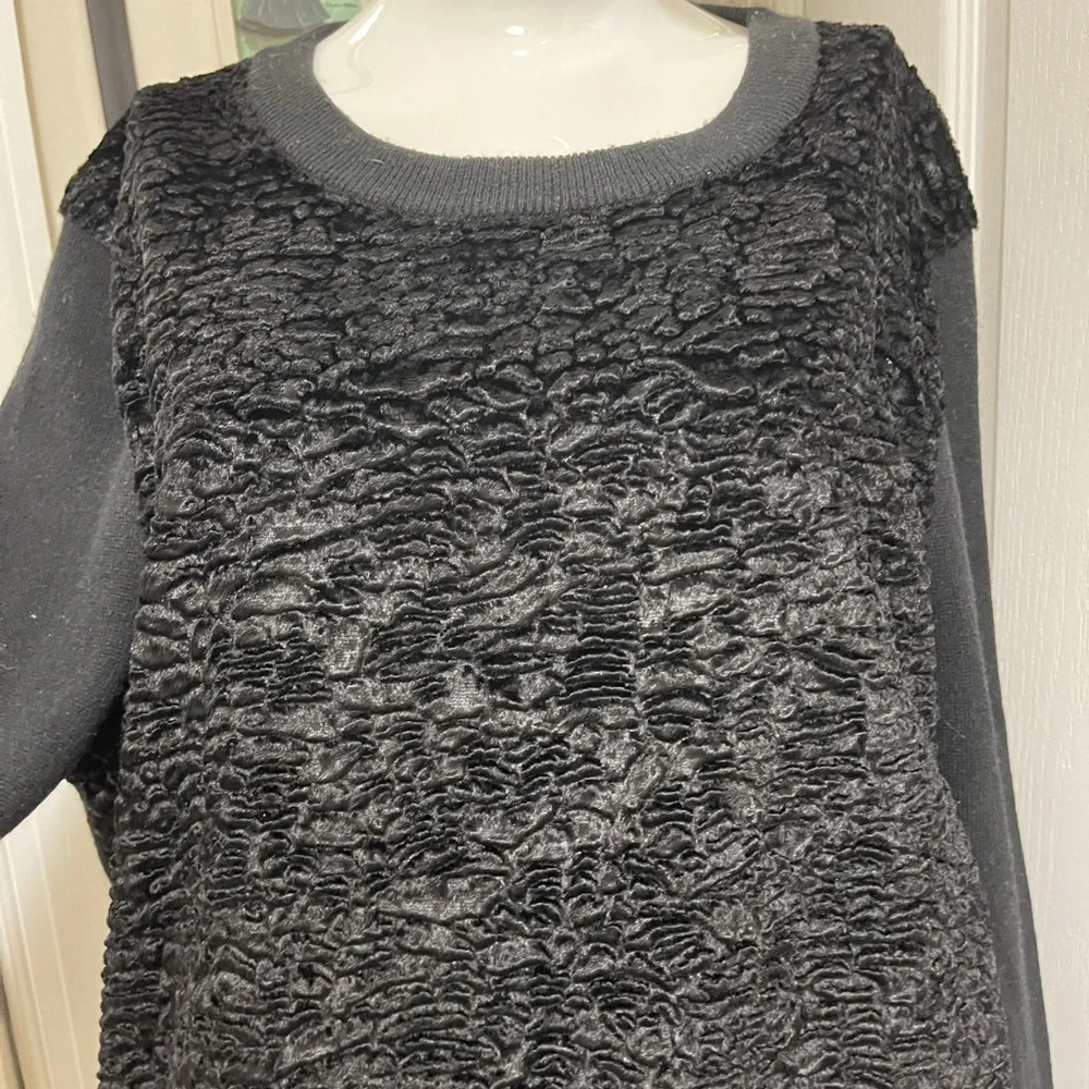 Kate spade black sweater. Looks like Front made with the unique sheep fur.